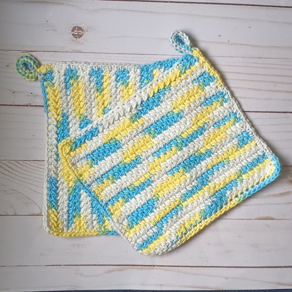 Handmade crocheted cotton pot holders. 2 pot holders in the set.